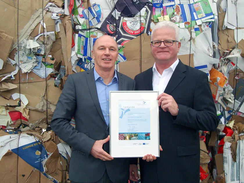 2 Geschäftsführer mit PUU Urkunde