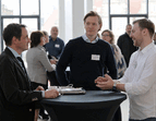 Teilnehmende des Partnertreffens beim Get-together